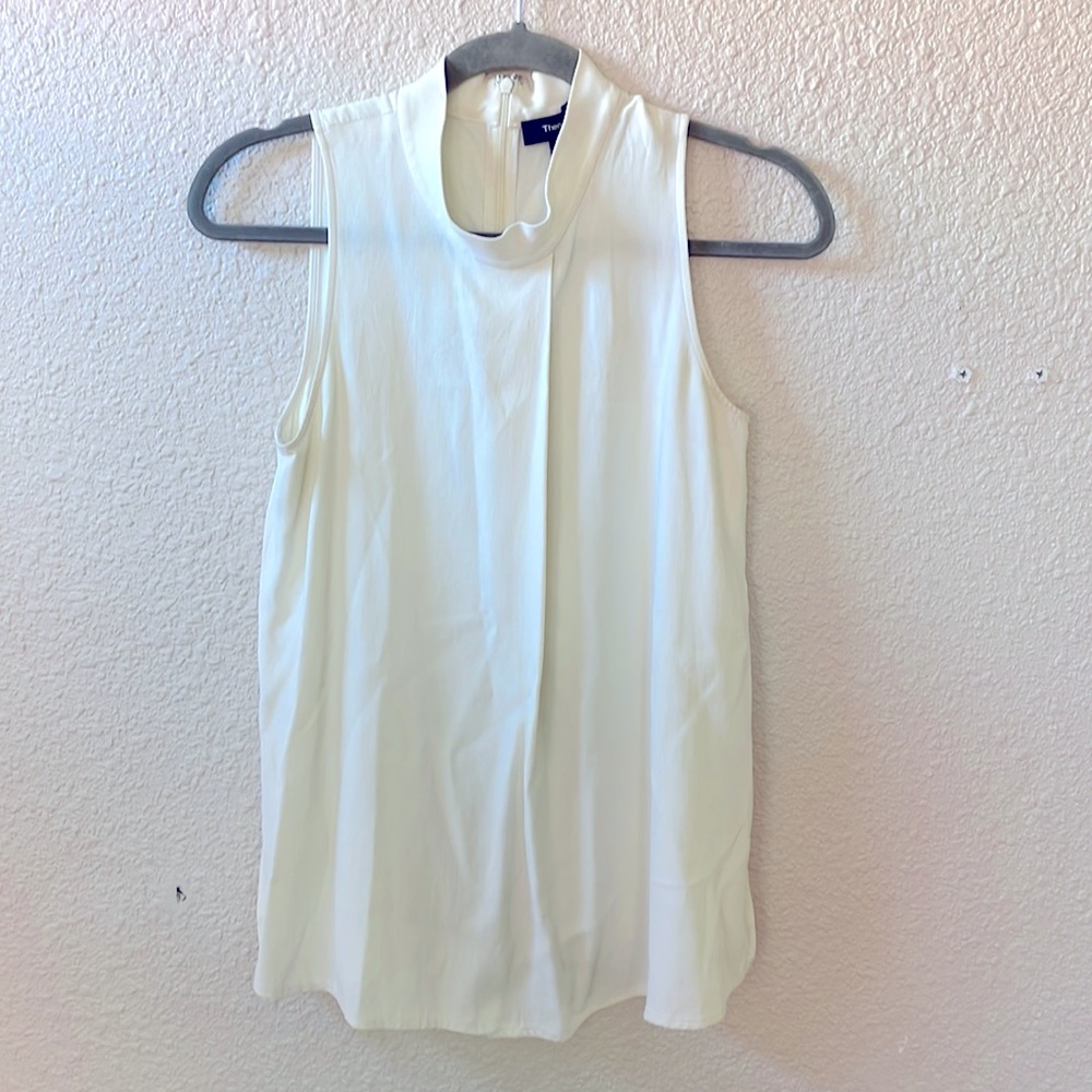 White sleeveless top